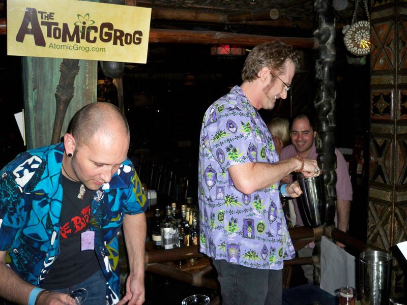 Hurricane Hayward, with assistance from Nik Satterfield, mixes his Atomic Zombie Cocktail.