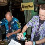Hurricane Hayward (right), with assistance from Nik Satterfield, mixes his Atomic Zombie Cocktail during the Zombie Jamboree at The Mai-Kai in April 2011. (Atomic Grog photo)