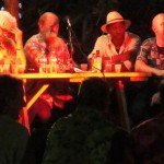 Judges (from left) Wayne Curtis, Stephen Remsberg, Ian Burrell, and Martin Cate have a difficult task judging five different rum barrel drinks, but somebody has to do it.