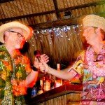 Hukilau emcee King Kukulele (right) introduces Master Mixologist host Jeff "Beachbum" Berry. (Photo by Go11Media.com)