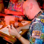 Martin Cate and the rest of the Rum Rat Pack begin scoring the drinks. (Photo by Go11Media.com)