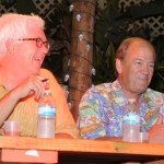 Judges Wayne Curtis (left) and Stephen Remsberg are amused at the schmoozing. (Photo by Go11Media.com)
