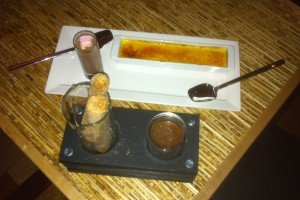 The deep-fried cheesecake (front) and eggnog crème brûlée with minty chocolate drink.