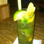 The Ginger Mojito featuring Thai rum, fresh mint, ginger-infused simple syrup and ginger candy garnish.