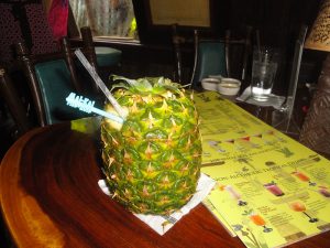 The Mai-Kai's Piña Passion, served in The Molokai bar in June 2016 with a 60th anniversary swizzle stick. (Photo by Hurricane Hayward)