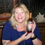 One of our lucky contest winners shows off her prize: Cinnamon syrup for making tasty cocktails.