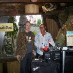 The Atomic Grog's Hurricane Hayward confers with DJ Jetsetter.