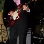 Skinny Jimmy leads the Stingrays through a set of classic surf tunes.