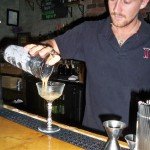 Sean Inglehart pours a Fudgepacker, a unique cocktail containing English chocolate walnut fudge-infused Johnny Walker Red Label whiskey.