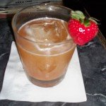 The Whiskey Ultimatum's garnish matches one of its unusual ingredients, strawberry rhubarb jam.