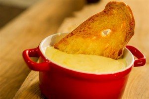 Cheese Fondue and Sourdough Bread, a featured dish at the Cheese marketplace Cheese Fondue and Sourdough Bread, a featured dish at the Cheese marketplace