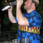 Matt Robold (aka Rumdood) shakes up cocktails at the Miami Rum Festival opening party at The Broken Shaker in Miami Beach on Monday, April 21