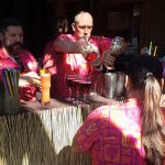 Bartenders are hard at work mixing up Trader Sam's Zombie Head Punch.