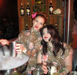 Bartenders Tiffney Allen (left) and Demi Anne Natoli from Kreepy Tiki Lounge conjure up an intoxicating brew with The Tsanta cocktail.