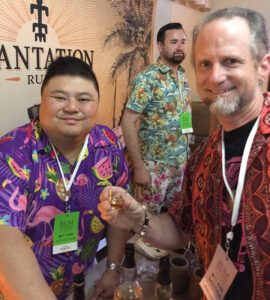 Longtime Plantation Rum ambassador Rocky Yeh presents Hurricane Hayward with a sip of one of the brand's latest blends at the Miami Rum Festival in May 2019. The much-loved industry veteran sadly passed away later that year. 