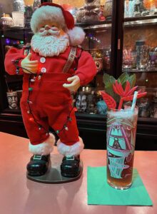 Endorsed by creepy Santas everywhere: Christmas Creeper by The Atomic Grog. Zombie glassware and swizzle by Brian Rechenmacher, aka B-Rex. (Photo by Hurricane Hayward, December 2021)
